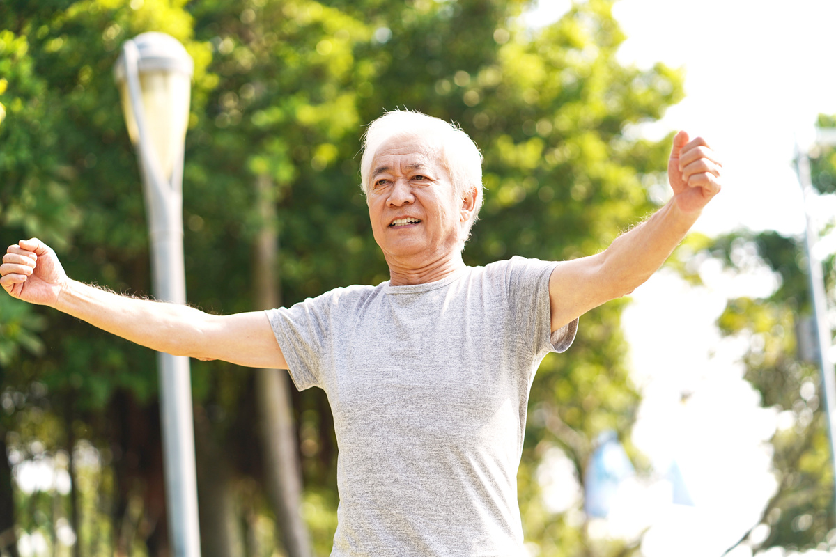 senior asian man exercising outdoors